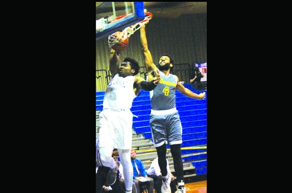 Fullerton pulls away from El Camino in basketball action ECC dunk ONLINE.jpg