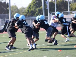 HS football practices prep for season opener
